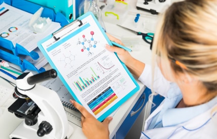 A person reading through quarterly updates